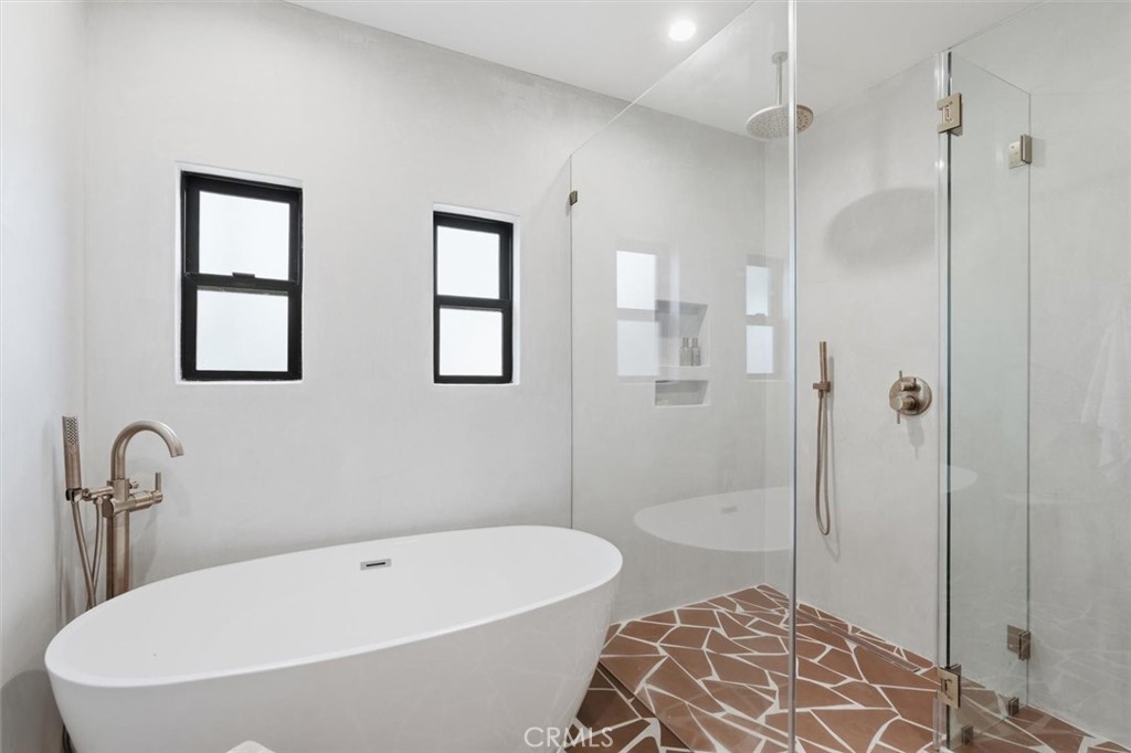 8140 Calabar Avenue Playa del Rey, CA 90293 - Photo 31 of 60 a white bath tub sitting next to a shower