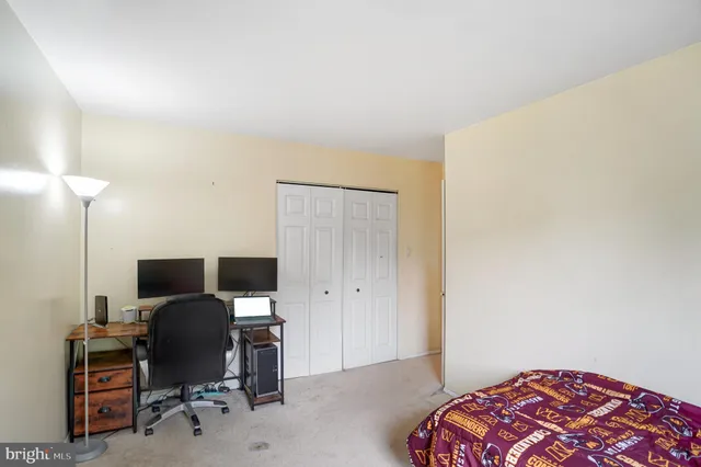 a workspace with furniture and lamp