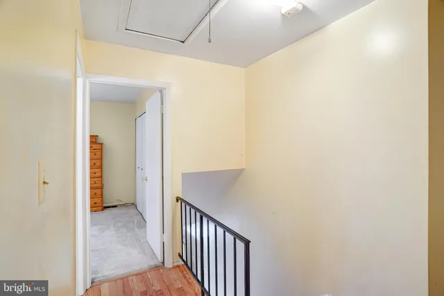 a bathroom with a sink mirror toilet and bathtub
