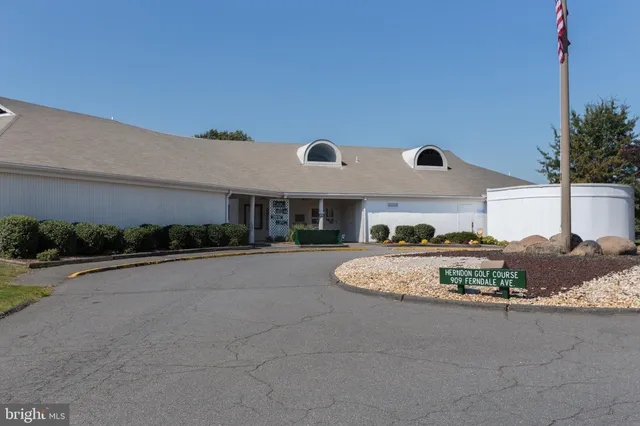 a view of a building with a street