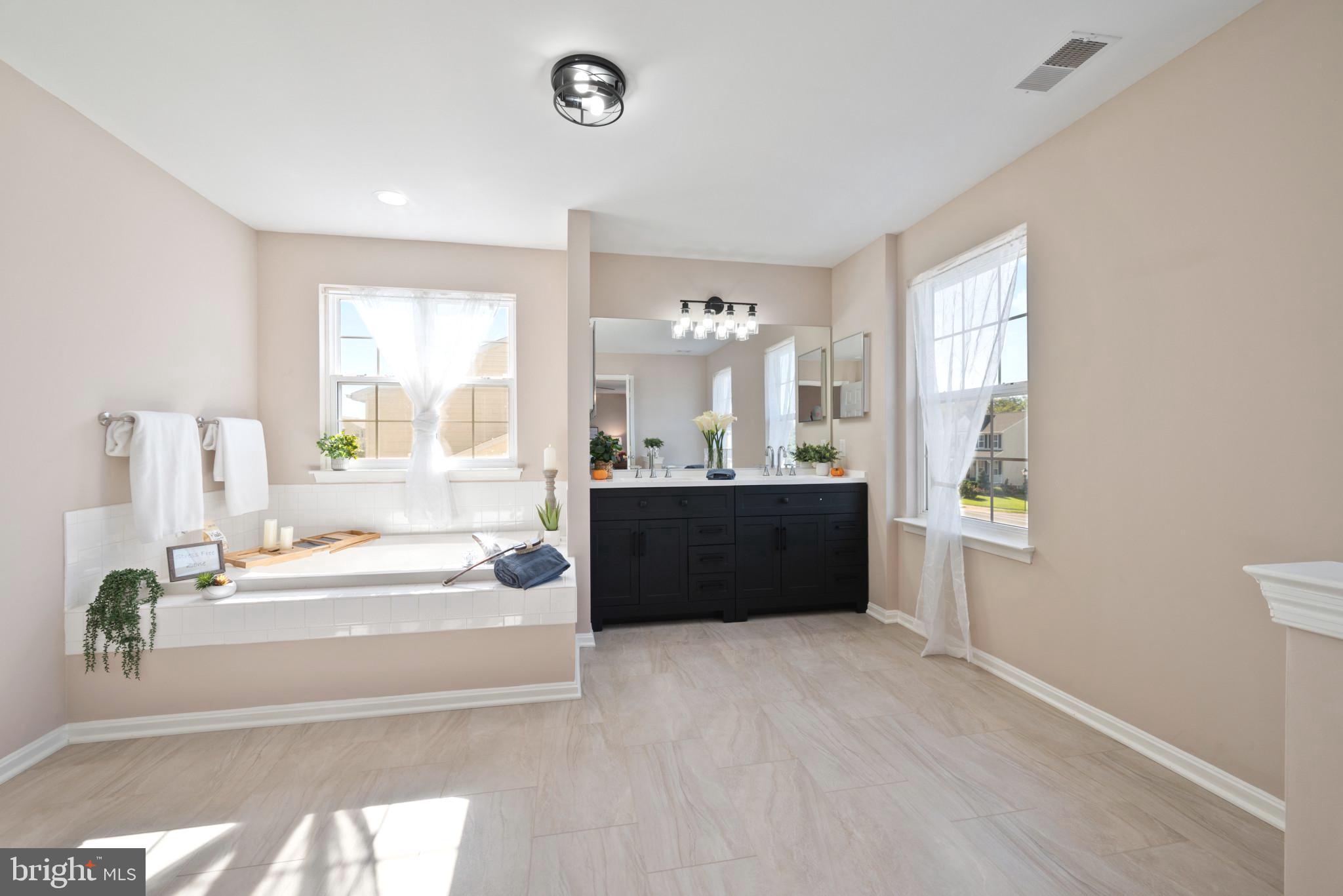 235 Colbert Street Taneytown, MD 21787 - Photo 9 of 18 Large Primary bathroom with soak tub an dual vanit