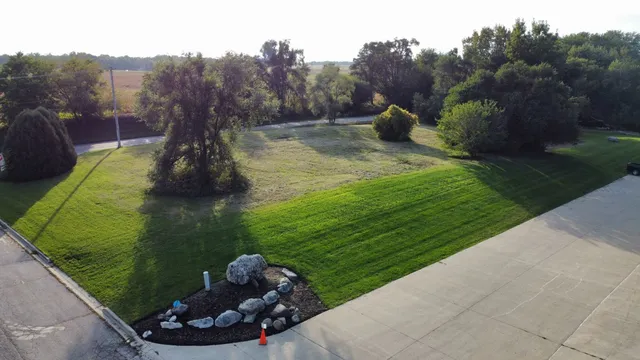 a view of a garden from a balcony