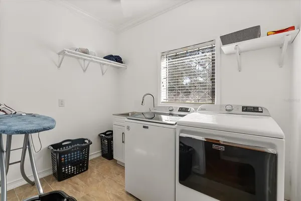 a view of a dining room kitchen and a counter top space