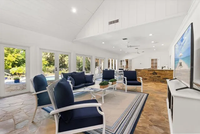 a bedroom with a bed and a dresser in it