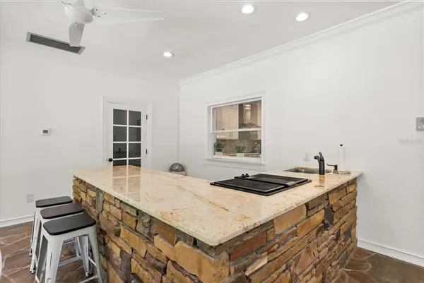 a picture of a bathroom with a shower