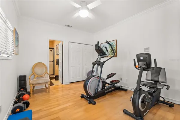 a living room with lots of furniture and a projector