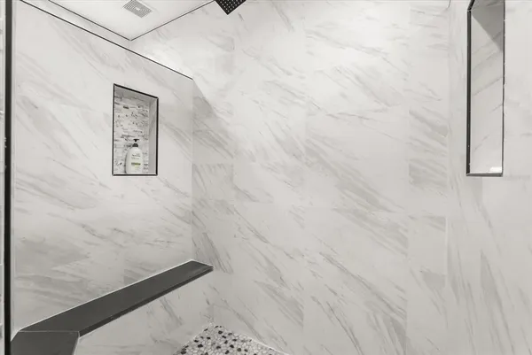 a view of swimming pool with outdoor seating and plants