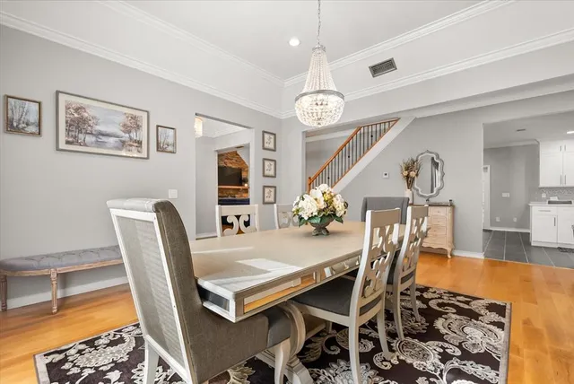 a living room with furniture potted plant and a window