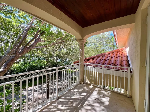 a bathroom with a granite countertop toilet a sink and bathtub