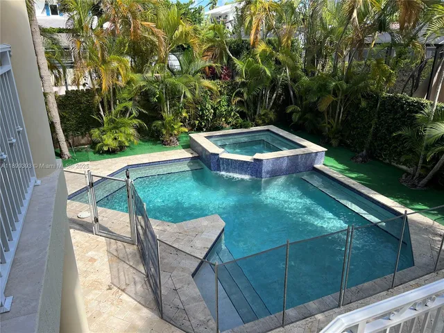 a view of a house with swimming pool