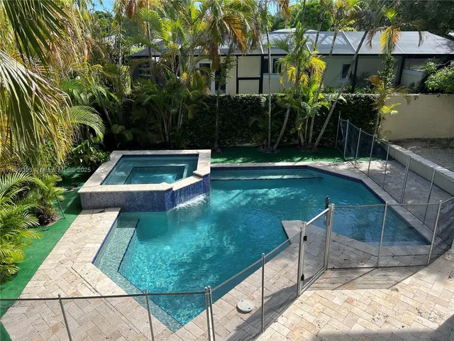 a view of an empty room with a fireplace