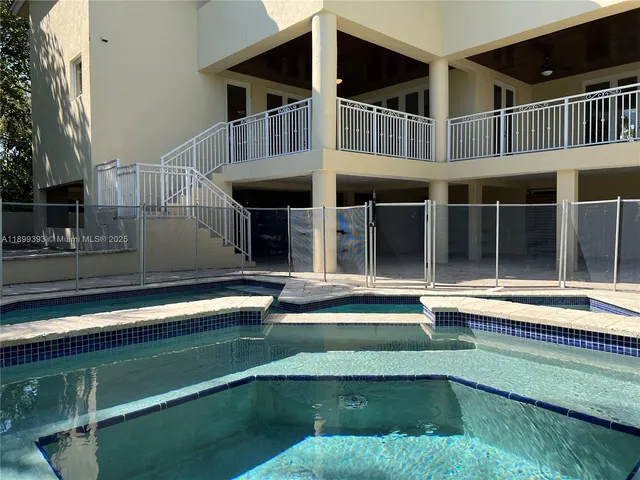 a view of a room with a large window