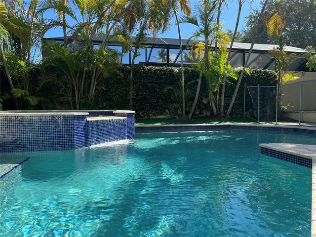 a view of empty room with windows