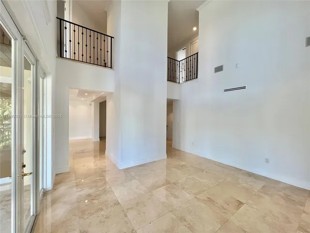a view of a hallway with entryway