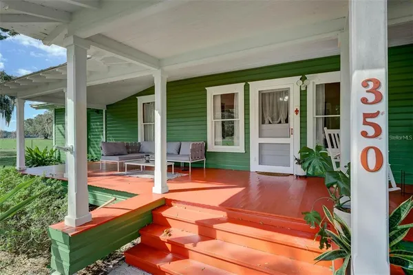 front view of a house with a swimming pool