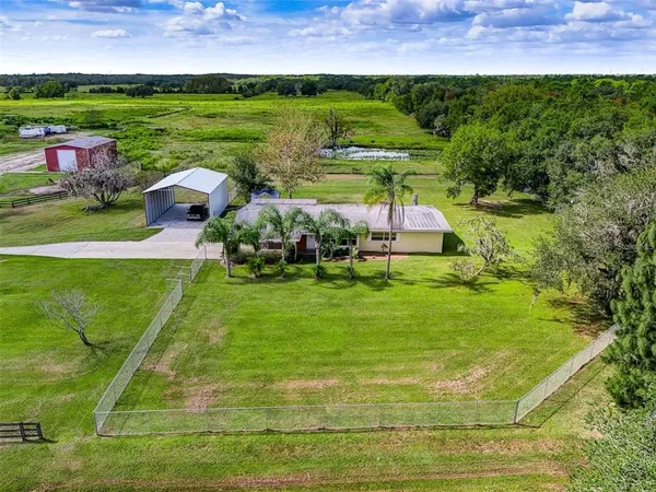 a view of an outdoor space and a yard