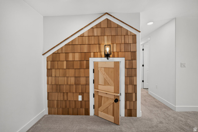 6536 West Muirfield Road Highland, UT 84003 - Photo 34 of 48 Decorative cedar shake wall with a pitched roofline accent
