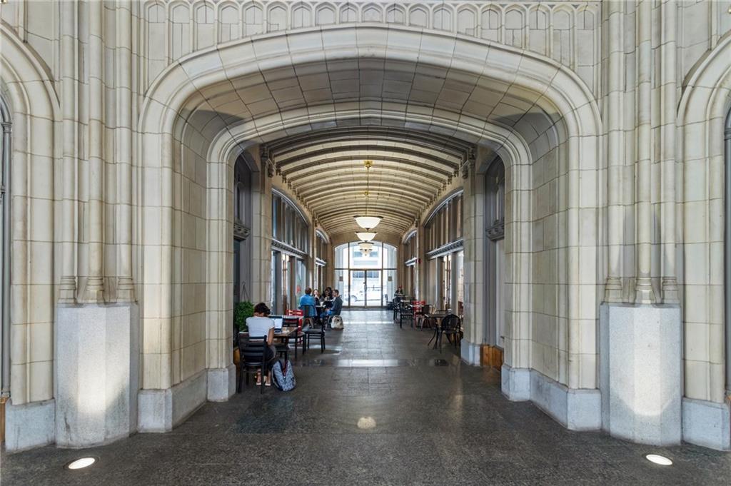 57 Forsyth Street Northwest, Unit 5F Atlanta, GA 30303 - Photo 8 of 44 a view of hall with chandelier