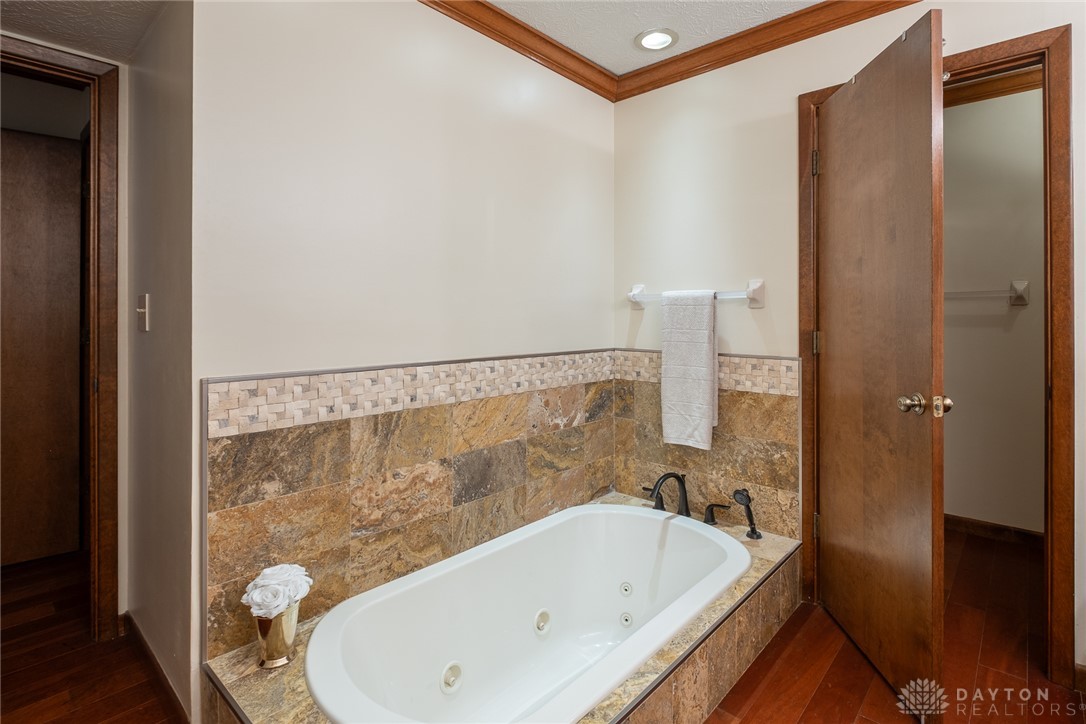 273 North Alpha Bellbrook Road Dayton, OH 45434 - Photo 25 of 43 Relax in this inviting primary bathroom featuring a spacious soaking tub.