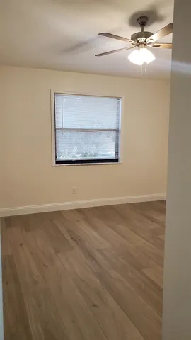 a view of a ceiling fan with a window
