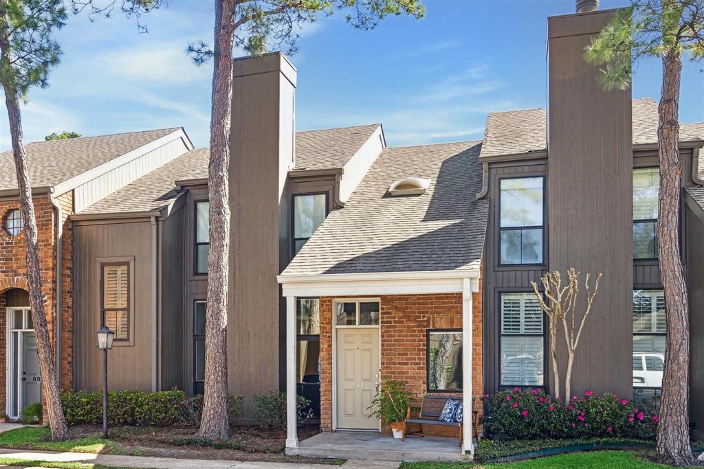 701 Bering Drive, Unit 804 Houston, TX 77057 - Photo 1 of 29 a front view of a building with garden