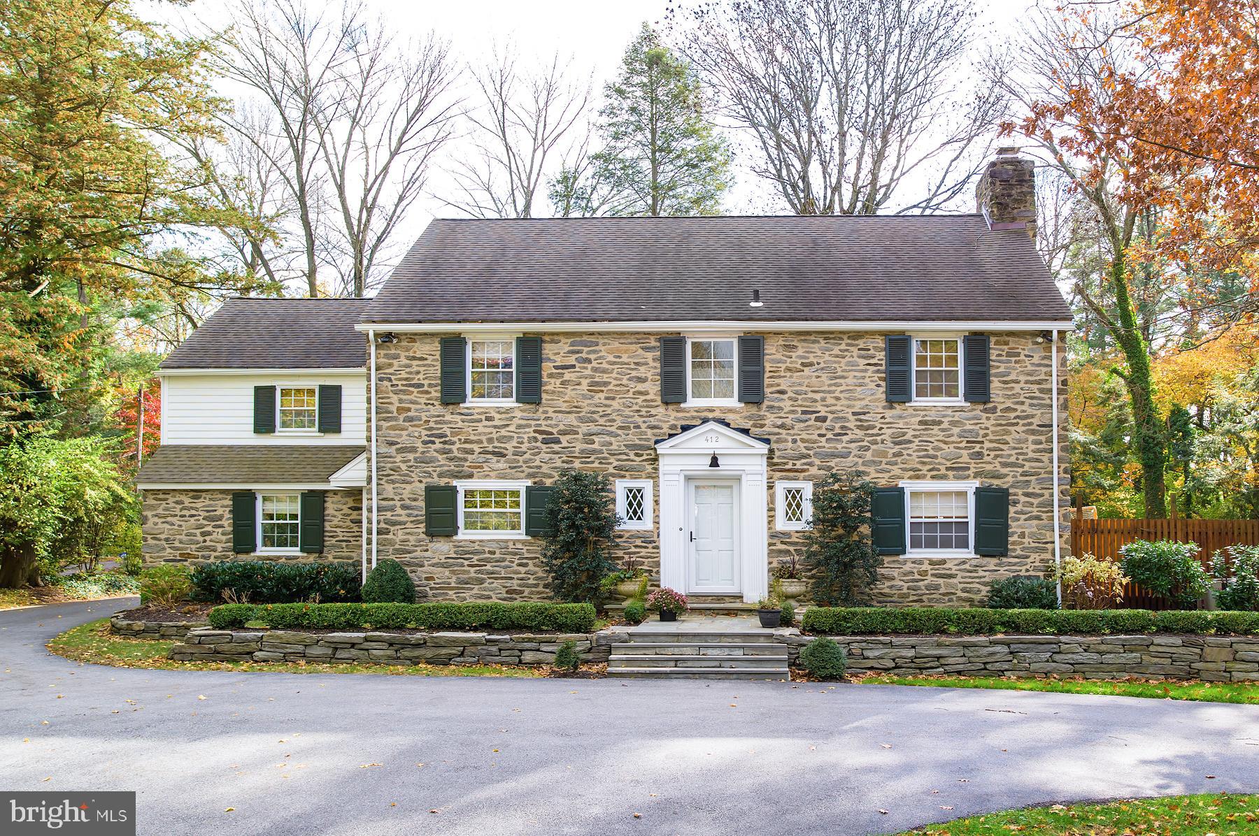 412 Righters Mill Road Narberth, PA 19072 - Photo 2 of 53 front view of house with a yard