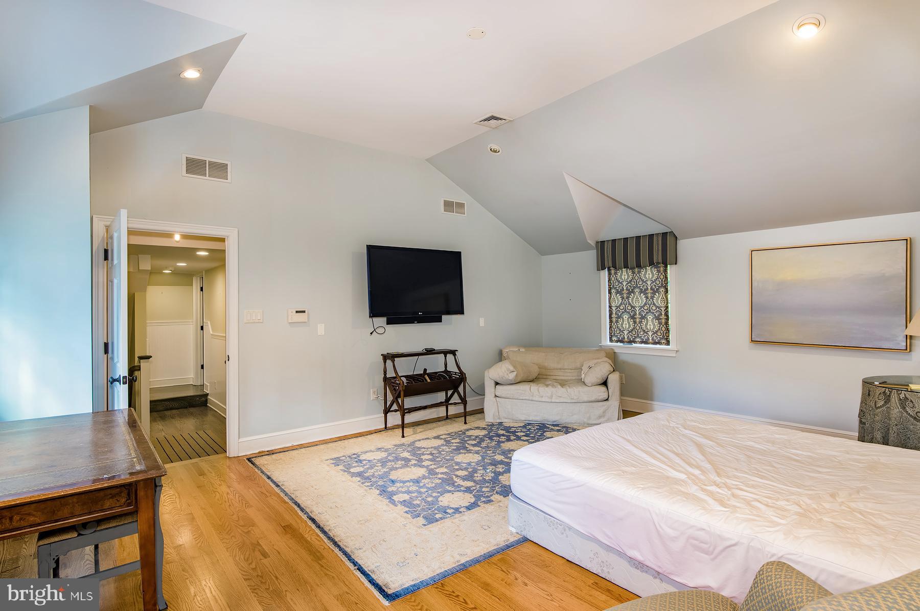 412 Righters Mill Road Narberth, PA 19072 - Photo 23 of 53 a bedroom with a bed and a flat screen tv