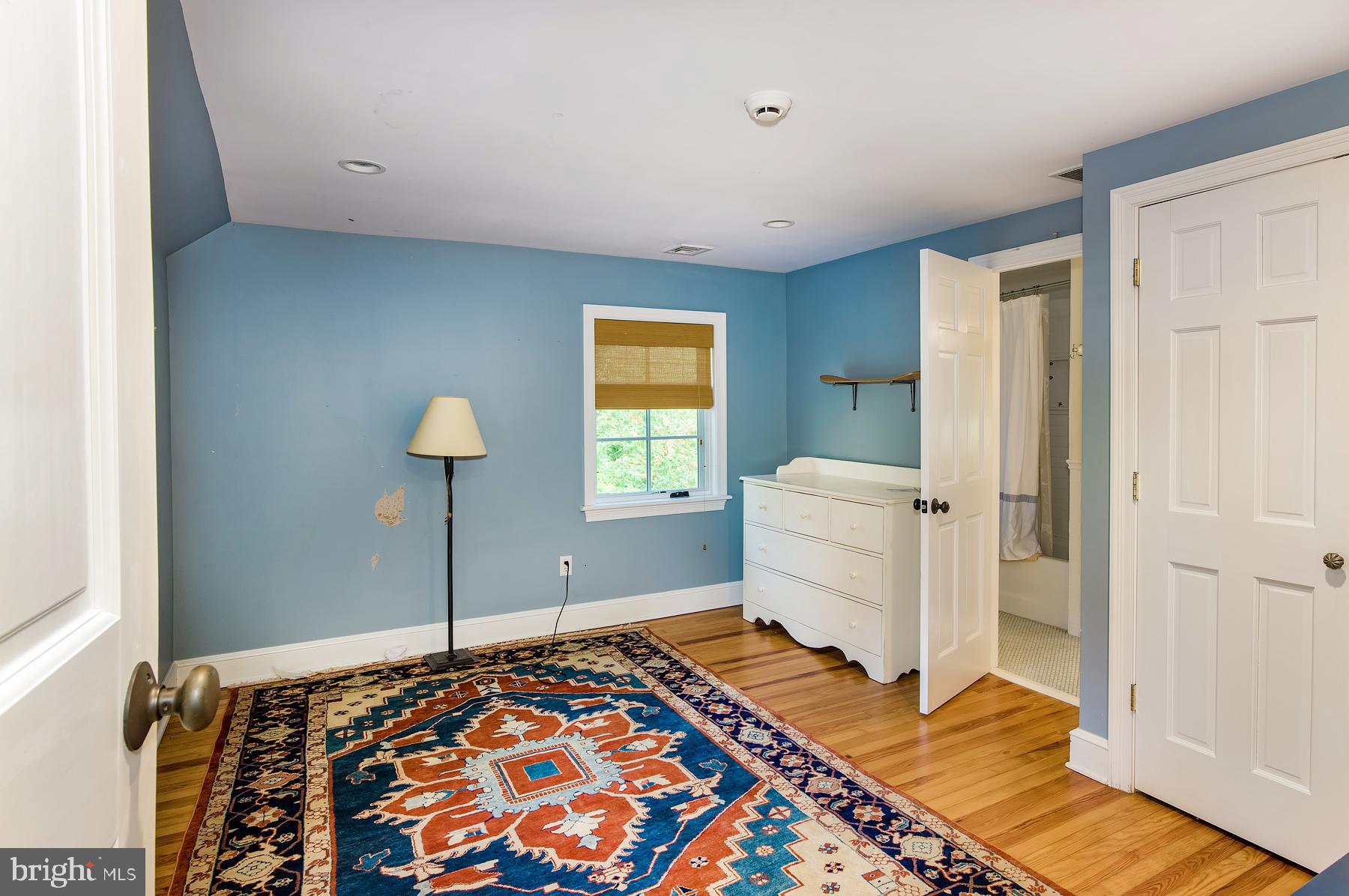 412 Righters Mill Road Narberth, PA 19072 - Photo 29 of 53 a bedroom with a bed and a window