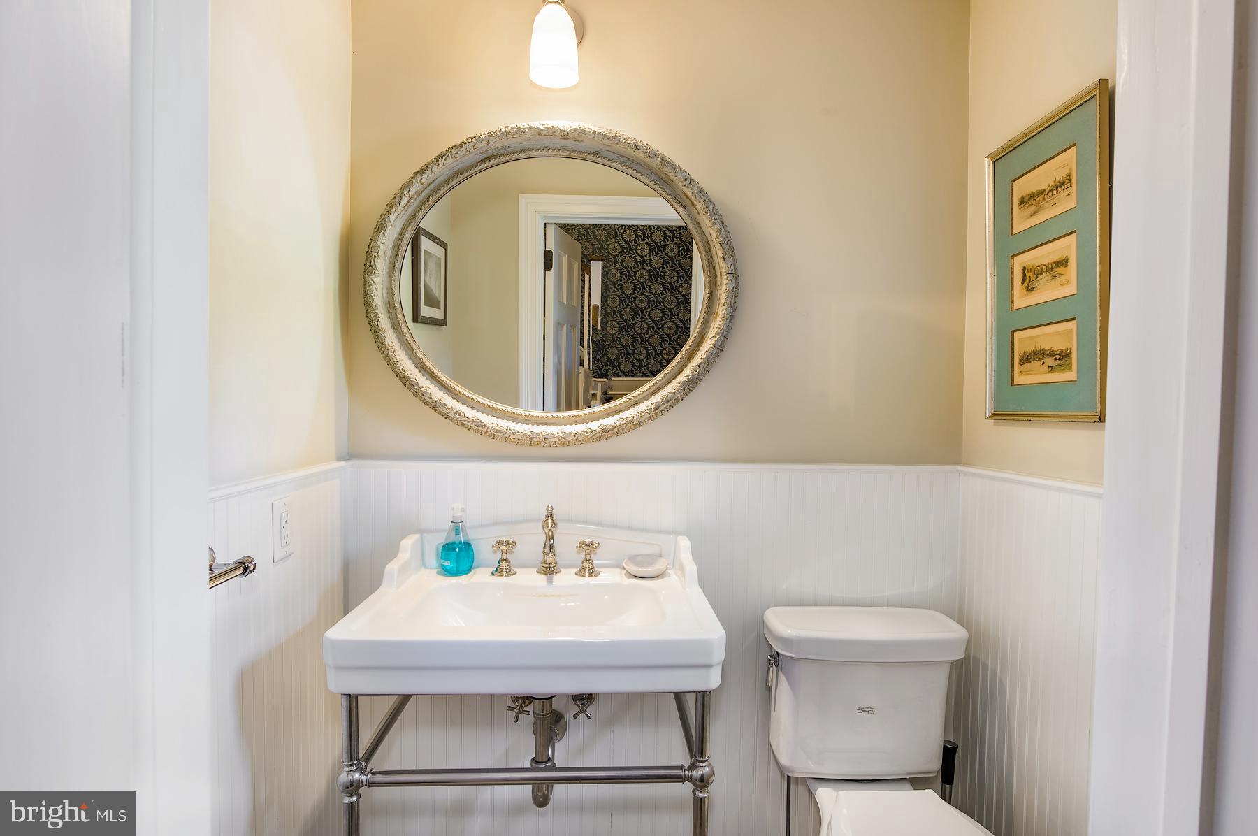 412 Righters Mill Road Narberth, PA 19072 - Photo 32 of 53 a bathroom with a sink a mirror and a toilet