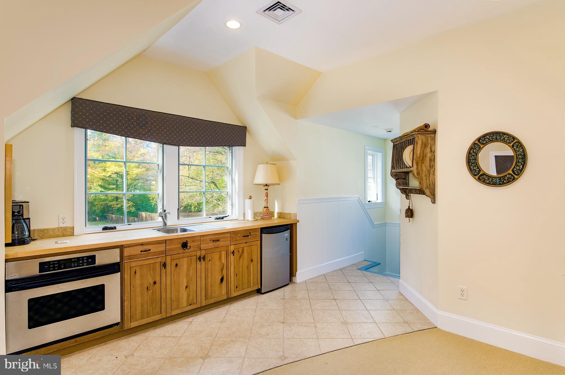 412 Righters Mill Road Narberth, PA 19072 - Photo 34 of 53 a kitchen with a sink and a stove top oven