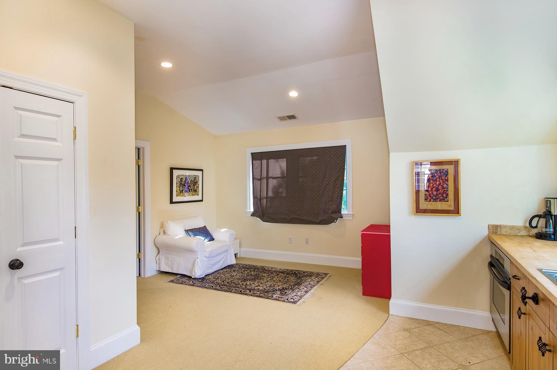 412 Righters Mill Road Narberth, PA 19072 - Photo 35 of 53 a bedroom with furniture and a flat screen tv