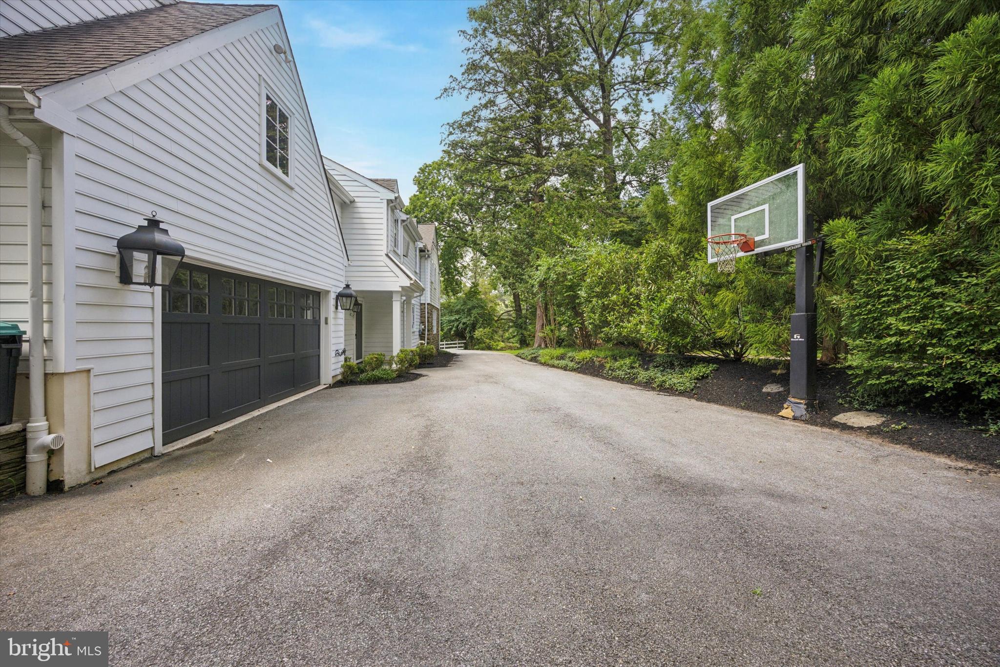 412 Righters Mill Road Narberth, PA 19072 - Photo 38 of 53 a view of a house with a yard and garage