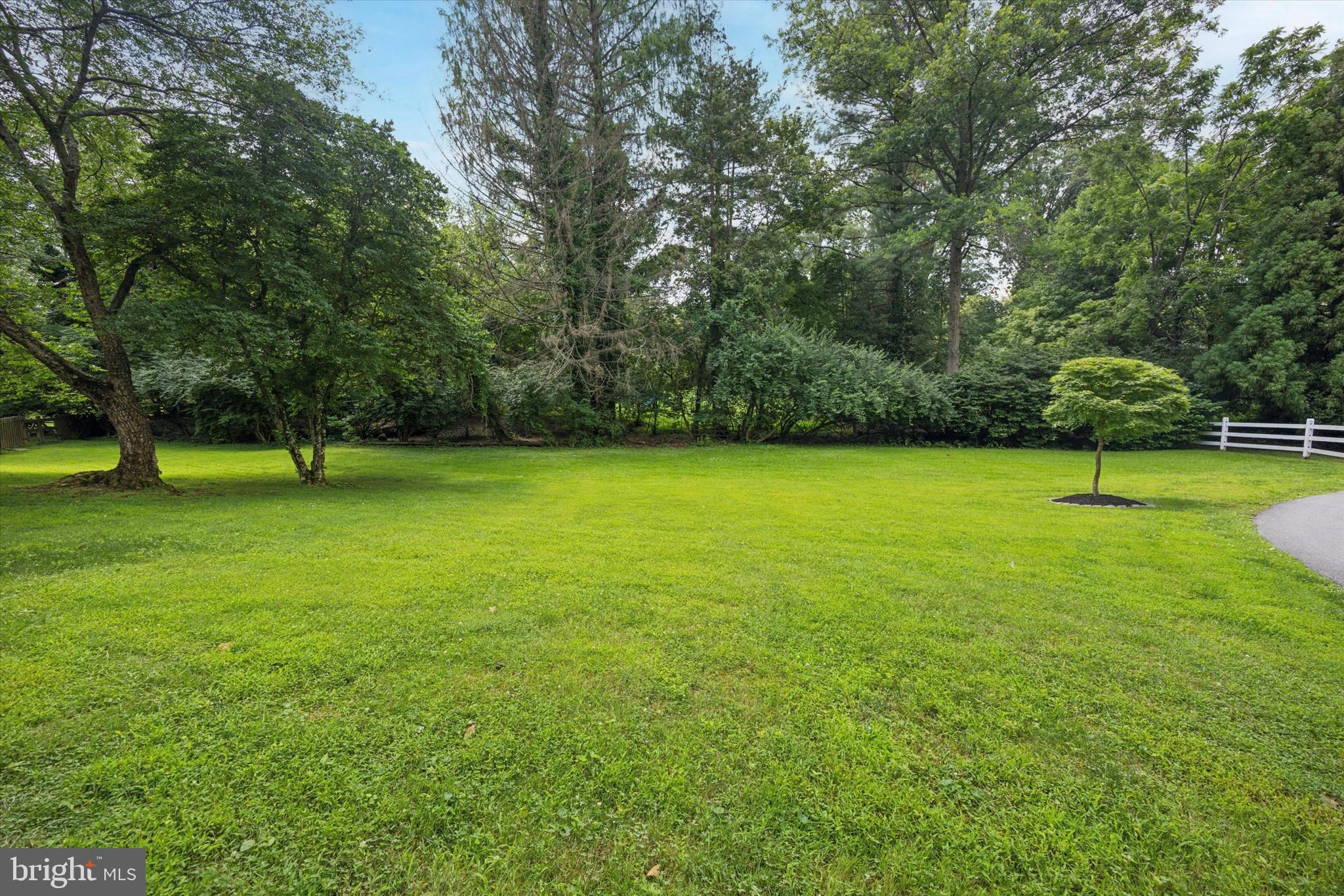 412 Righters Mill Road Narberth, PA 19072 - Photo 48 of 53 a view of a field with a tree in the background