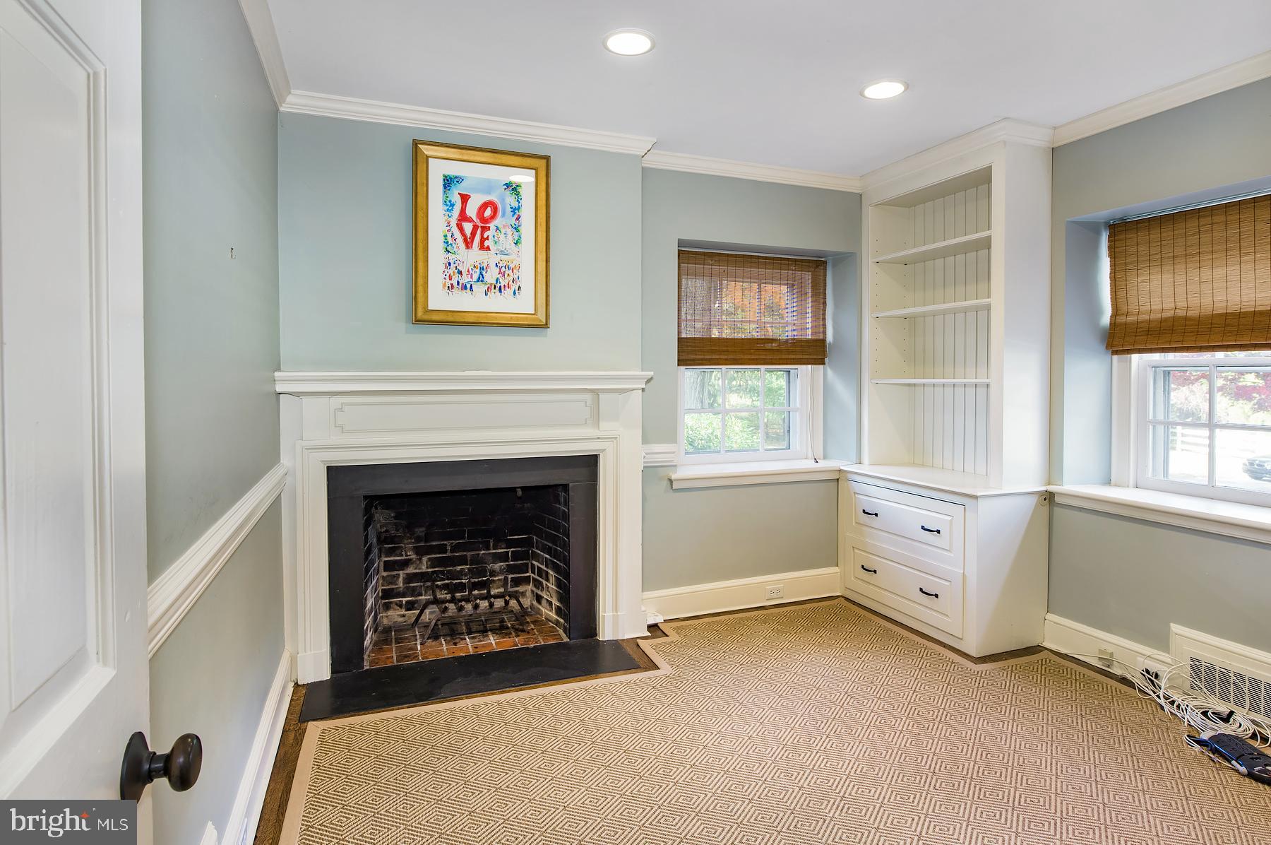 412 Righters Mill Road Narberth, PA 19072 - Photo 8 of 53 a living room with furniture and a fireplace