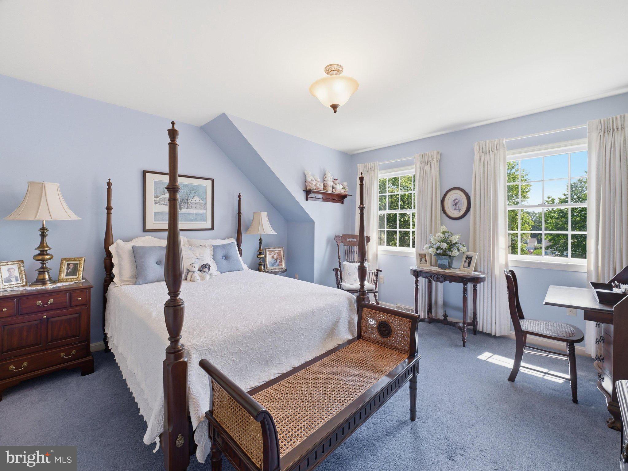 2606 Ridge Road South Martinsburg, WV 25403 - Photo 31 of 57 Charming bedroom with serene blue hues.