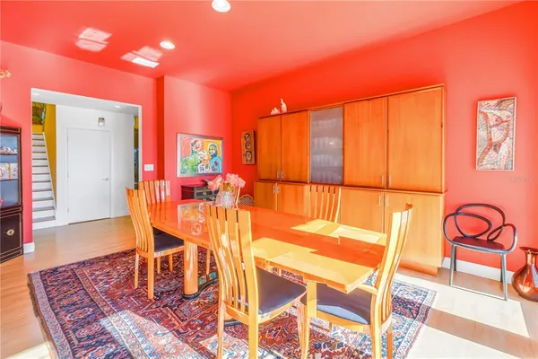 a swimming pool with outdoor seating and yard