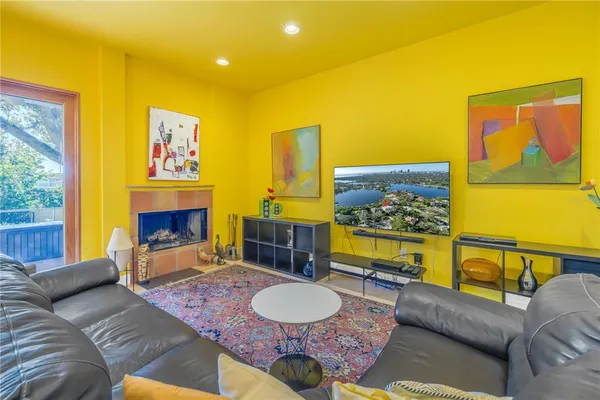 a view of a hallway with paintings on the wall