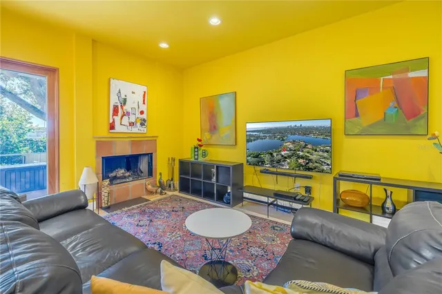 a view of a hallway with paintings on the wall