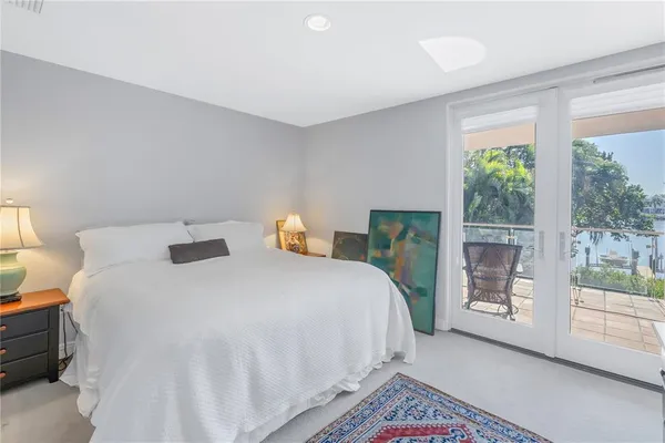 a view of a chairs and table in patio