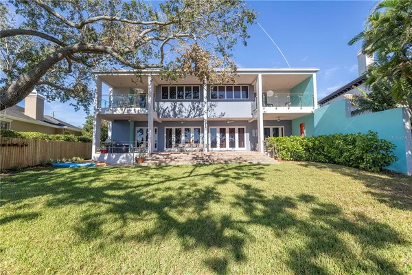 a potted plant in front of a door