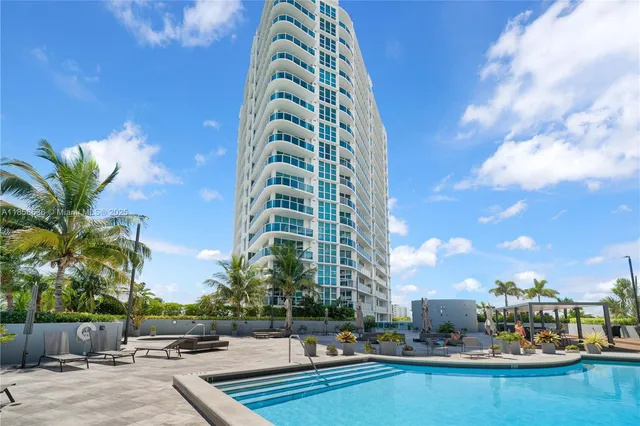 a view of a tall white building