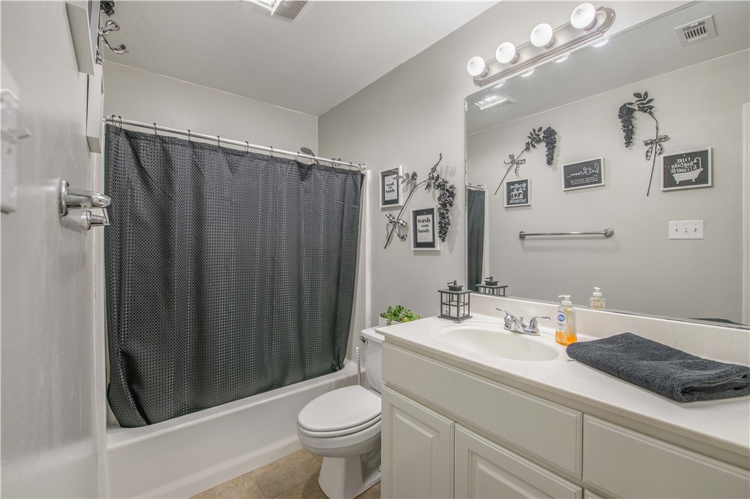 6538 Olympia Buddy Road College Station, TX 77845 - Photo 29 of 50 a bathroom with a sink toilet and shower