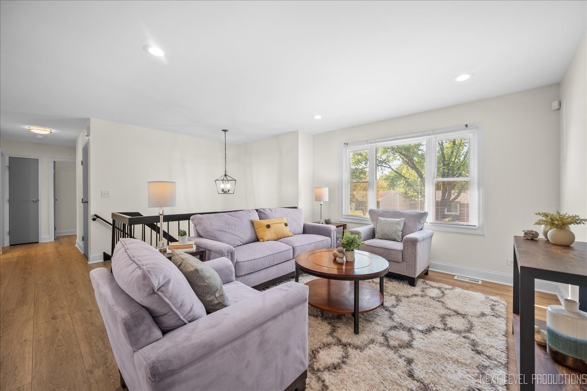5628 Crestwood Road Matteson, IL 60443 - Photo 6 of 29 a living room with furniture and a large window