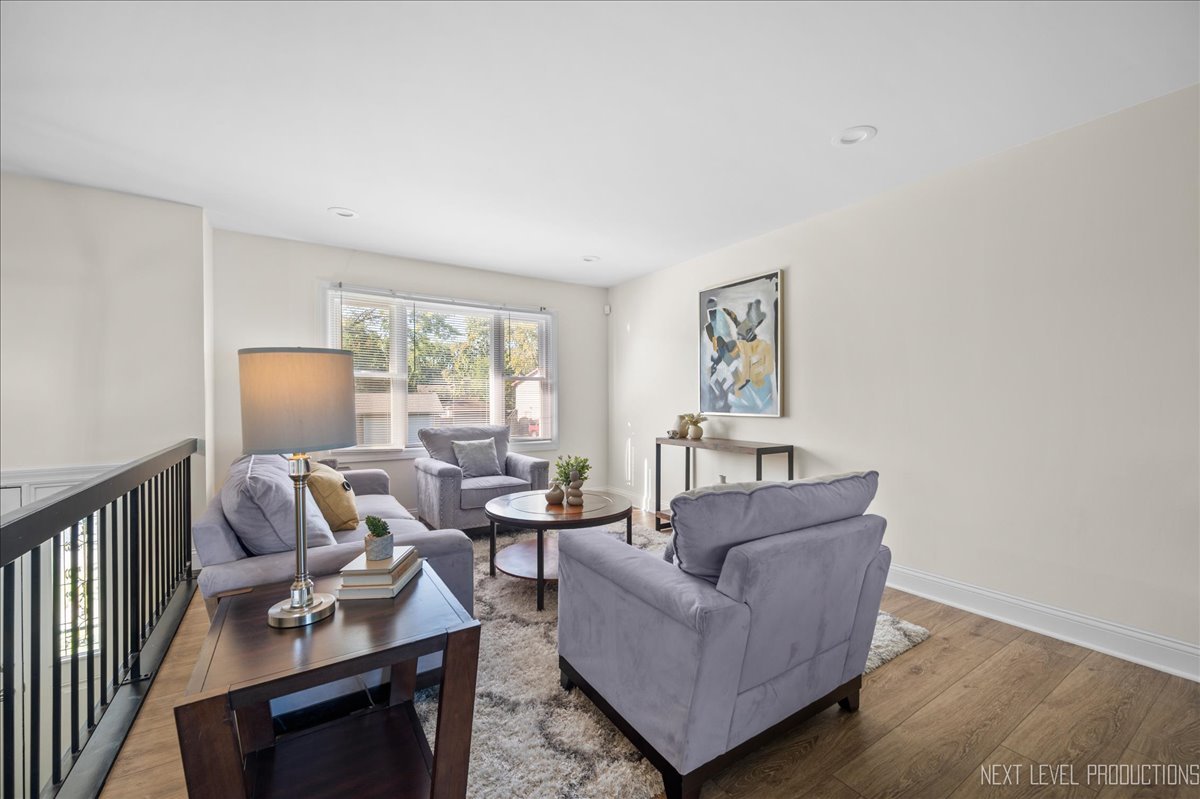 5628 Crestwood Road Matteson, IL 60443 - Photo 7 of 29 a living room with furniture and a window