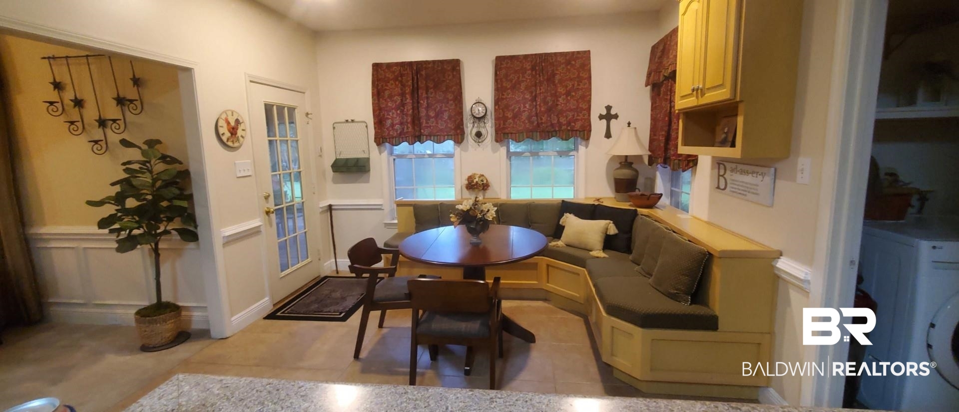 31163 Woodland Way Daphne, AL 36527 - Photo 23 of 44 Dining room featuring washer / clothes dryer and light tile patterned floors