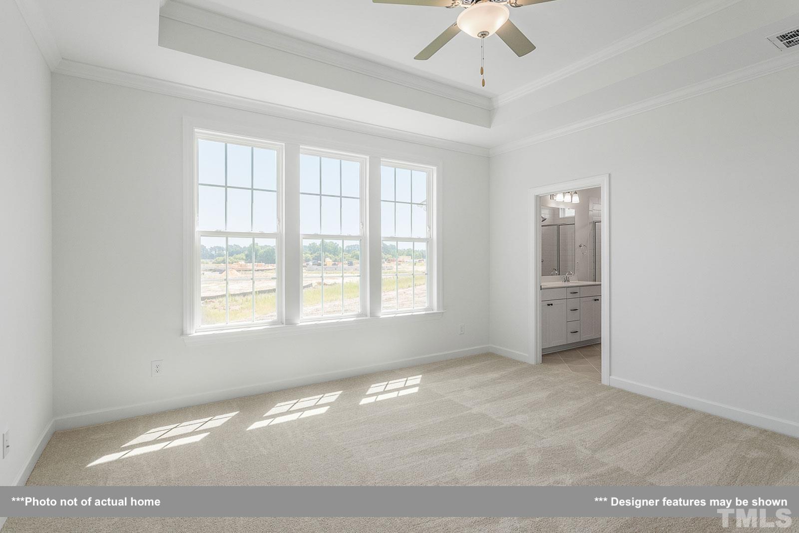 201 Dungannon Loop Clayton, NC 27520 - Photo 11 of 35 a view of an empty room with a window