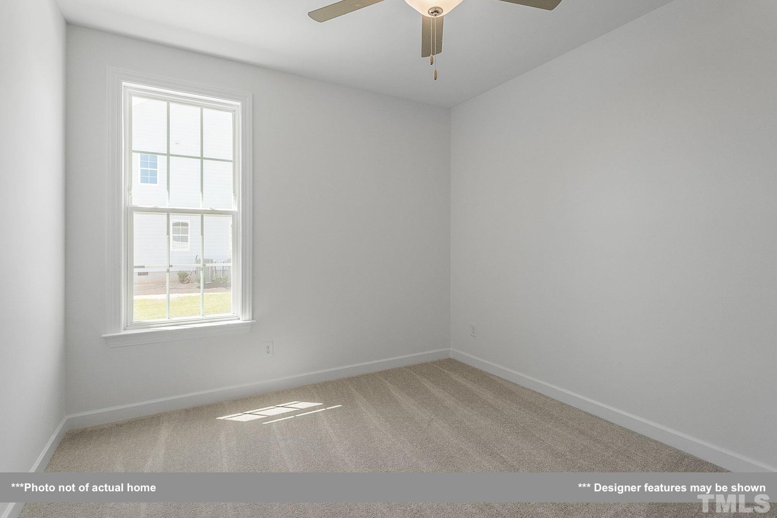 201 Dungannon Loop Clayton, NC 27520 - Photo 15 of 35 an empty room with a window