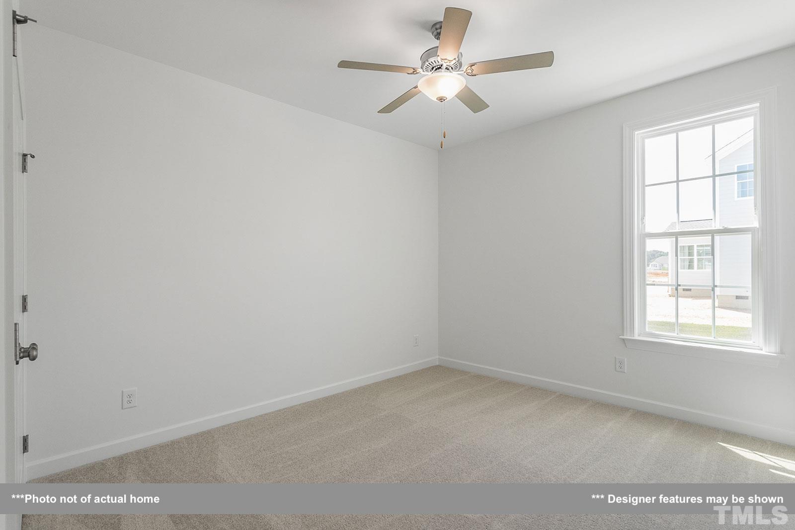 201 Dungannon Loop Clayton, NC 27520 - Photo 17 of 35 an empty room with a window
