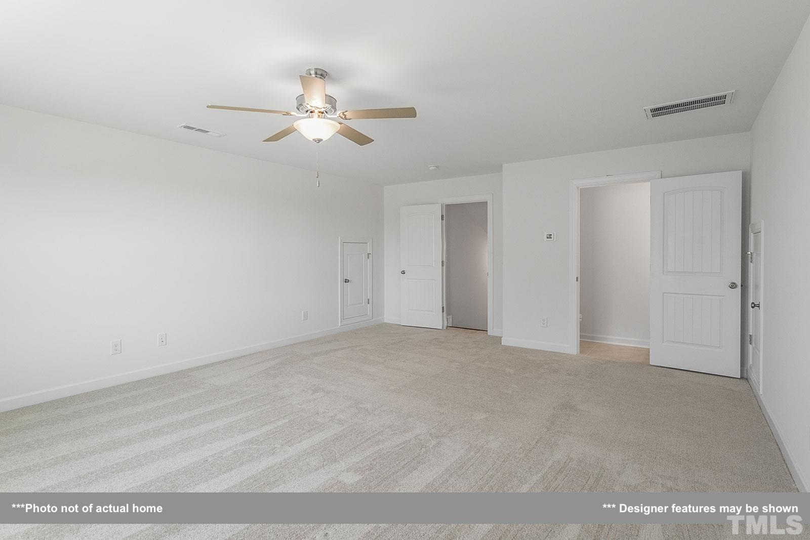 201 Dungannon Loop Clayton, NC 27520 - Photo 19 of 35 a view of an empty room