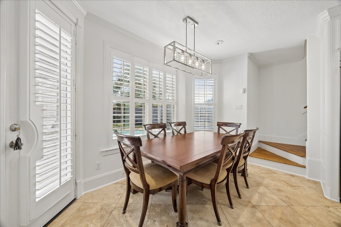 3711 Drake Street Houston, TX 77005 - Photo 11 of 34 Informal eating in the breakfast area overlooking the backyard with back staircase access.